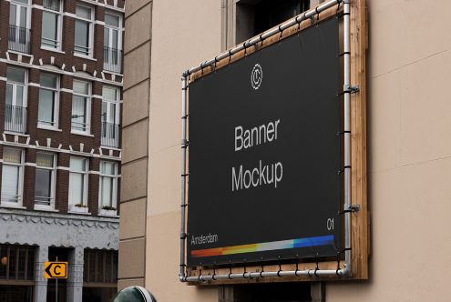 Outdoor banner mockup on building wall for graphic design presentations, urban environment, realistic template display.